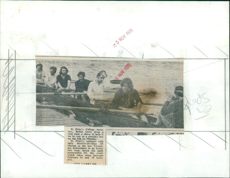 Robin Lowe gives a trial eight a shove to help it on its way during a practice row on the Isis in Oxford. - Vintage Photograph