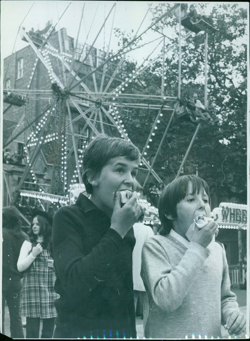 People of all ages enjoying the St Giles Fair in Oxford. - Vintage Photograph