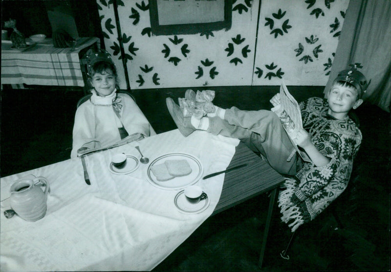 A moment of relaxation for the King and Queen of the Headington Youth Theatre. - Vintage Photograph