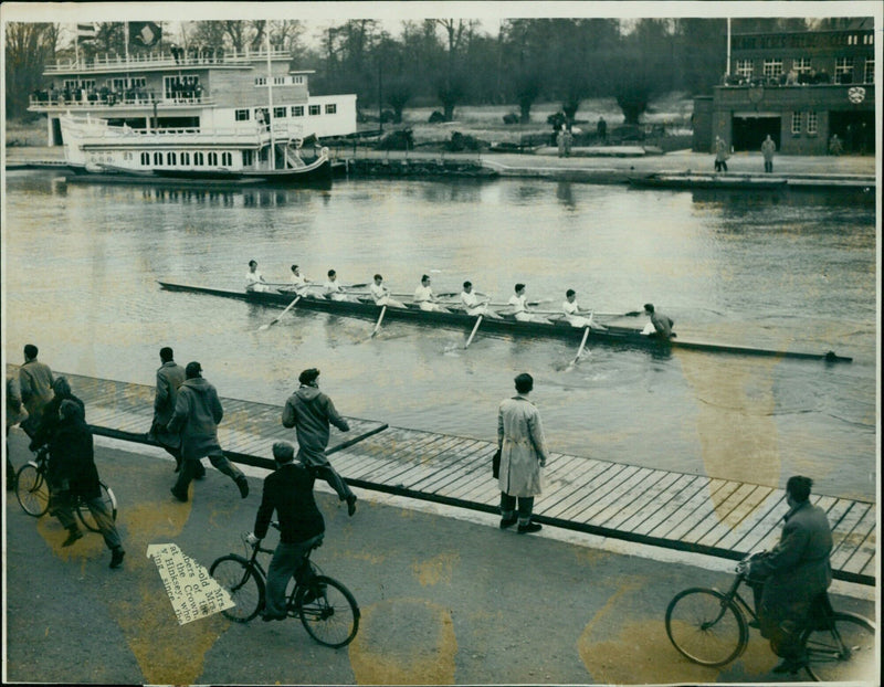 Mrs. Hinksey pulls ahead of the competition in a rowing race at Oxford University. - Vintage Photograph