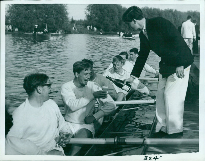 St. Edmund Hall celebrates their victory in the Oxford Summer Eights Rowing Race on May 29, 1961. - Vintage Photograph