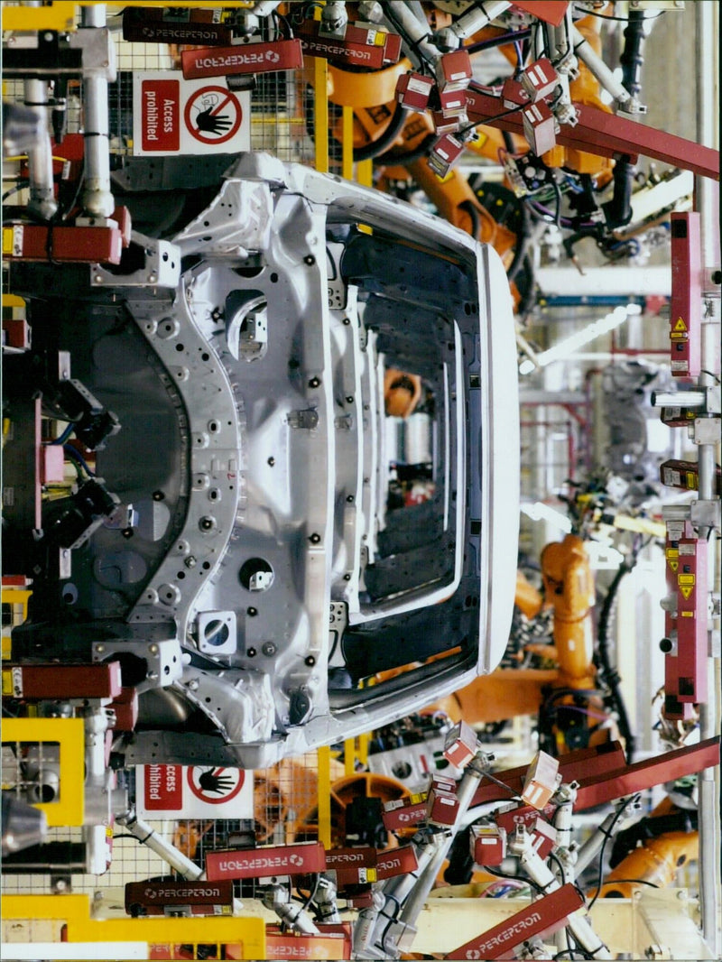 Employees of the BMW Group Plant Oxford are seen being prohibited access to Perceptron cameras. - Vintage Photograph