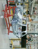 Representatives from Cowley BMW present the new MINI model. - Vintage Photograph