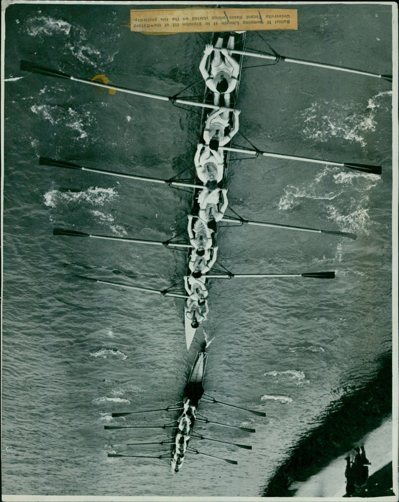 Balliol College boat competes in the Oxford University Torpid Races on the Isis River. - Vintage Photograph