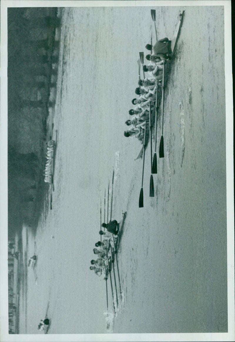 Competitors in the Tor Pids race on the Balliol Old III course stretch past Green Bank on February 20, 1961. - Vintage Photograph