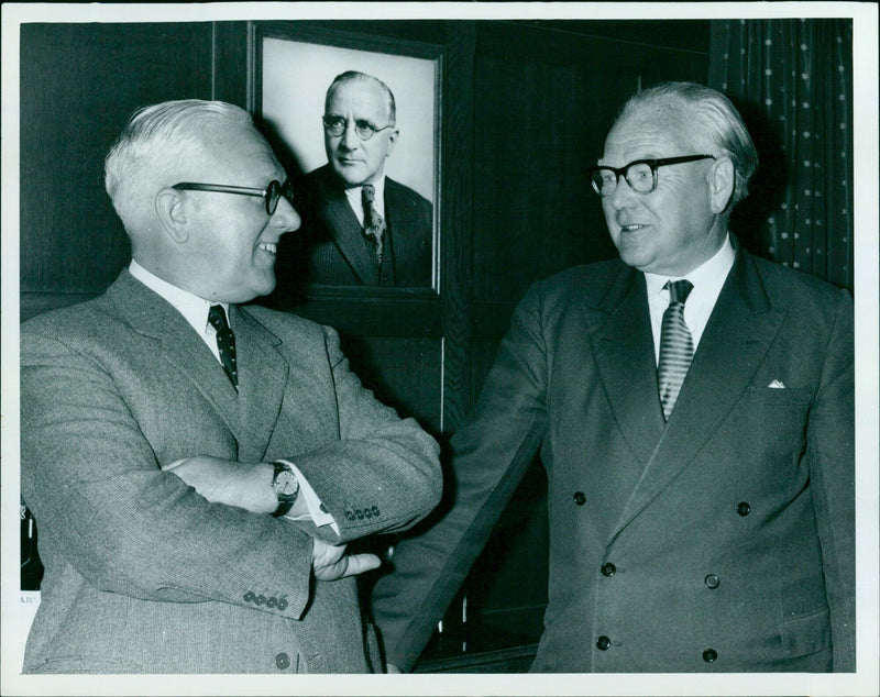 Three long-serving factory personalities are remembered in the boardroom of British Leyland's Cowley Division. - Vintage Photograph