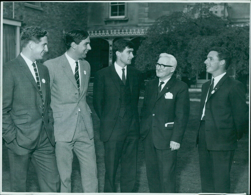 Five men pose for a photo at a Rotarien reception held in their honour at Freemans Hallzon, Oxford, UK. - Vintage Photograph