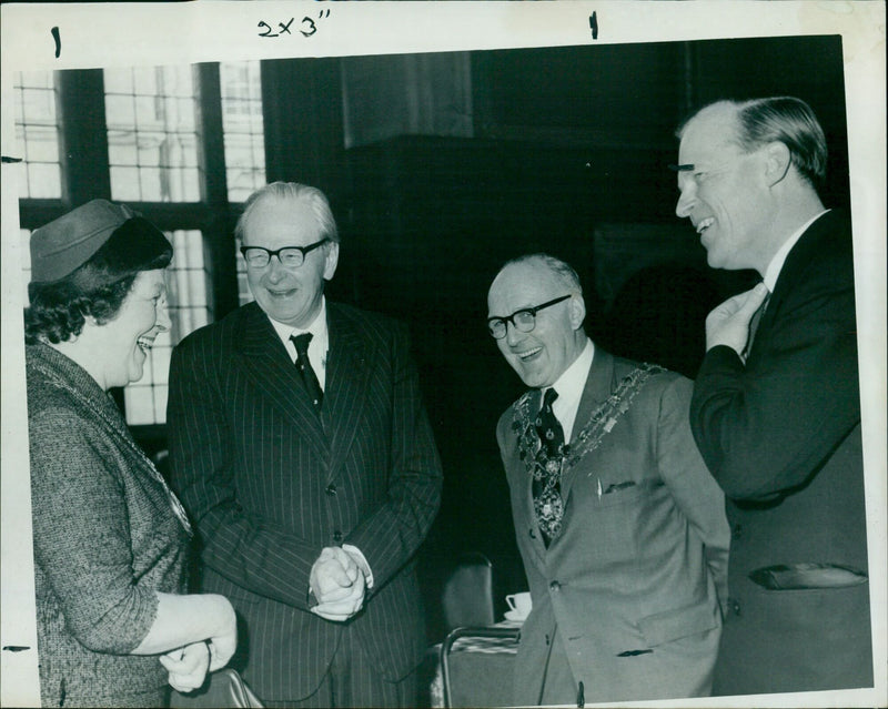 Oxford dignitaries joining the Freedom from Hunger Campaign by partaking in a cheese roll and coffee for lunch. - Vintage Photograph