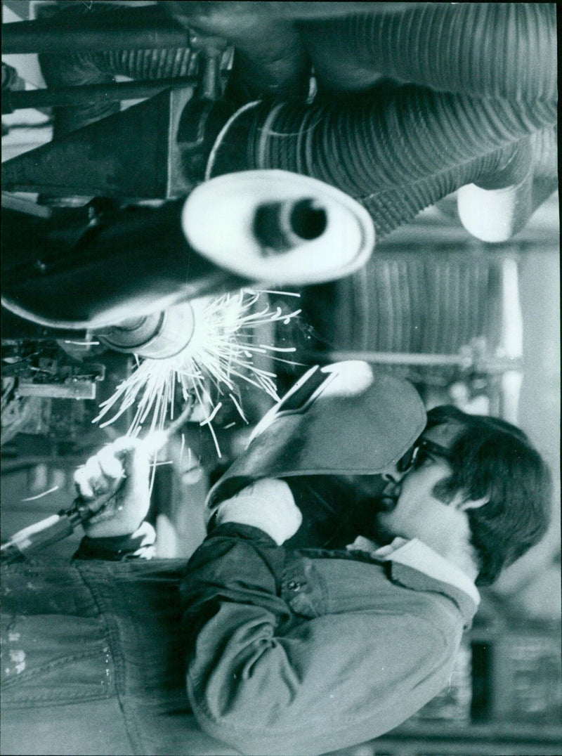 Rob Judges exhales a plume of smoke during a radiator party in Chichiede, Johr Reeve. - Vintage Photograph