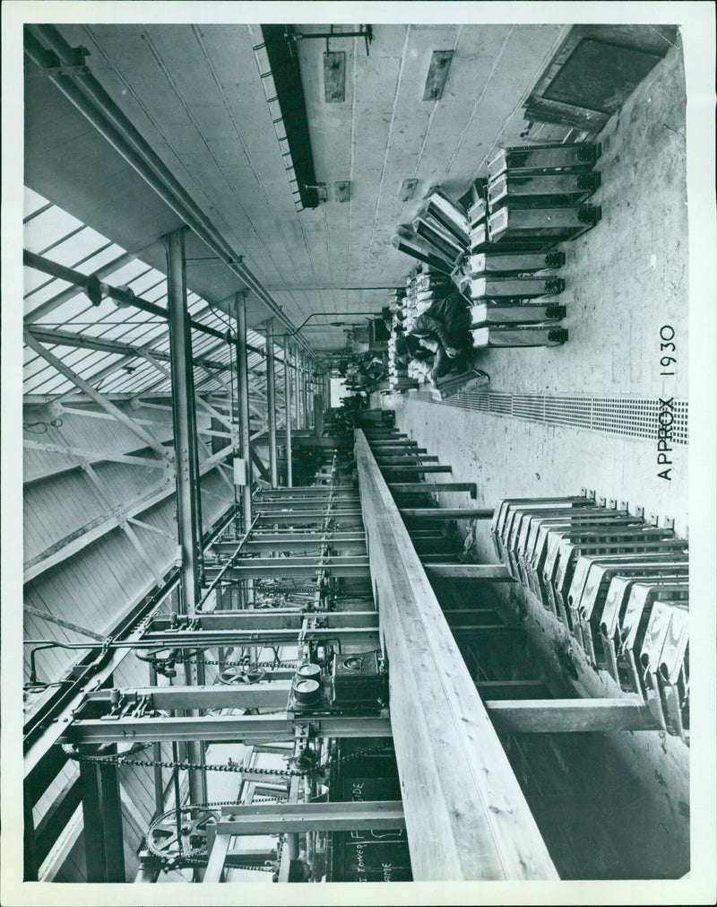 A view of the side of a tower at Macun in approximately 1930. - Vintage Photograph