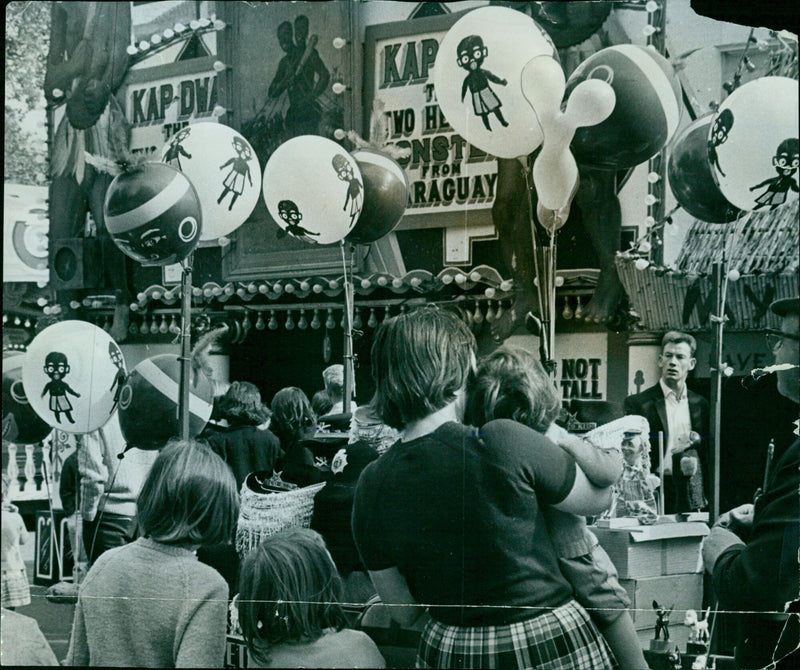 Wasps and a lone bee swarm a busy St. Giles' Fair. - Vintage Photograph