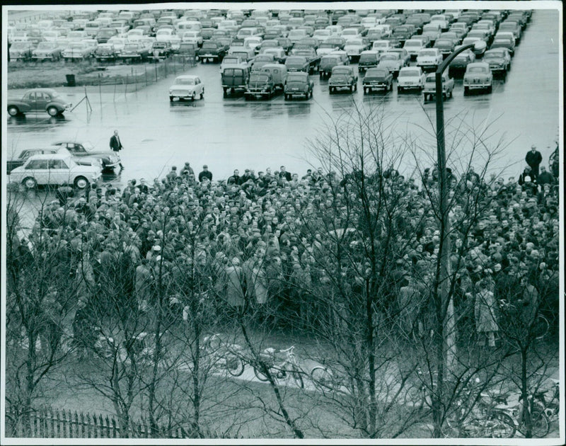 Employees of the B.M.C. Service gather for a mass meeting in Oxford, England. - Vintage Photograph