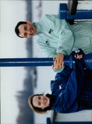 The sun sets over a hillside in the evening. - Vintage Photograph