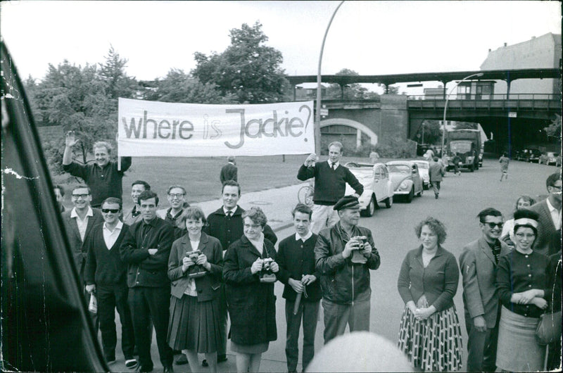 Members of the Kennedy family arrive in Berlin to meet President Kennedy and celebrate his historic visit to the city in July 1963. - Vintage Photograph