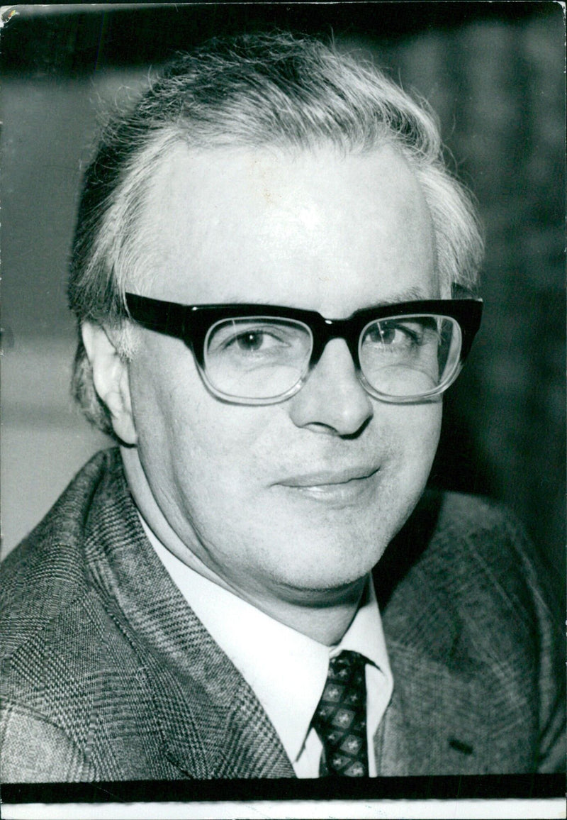 British Politician Bruce Millan M.P., Secretary of State for Scotland since 1976, speaks during a press conference in London on October 20th, 1982. - Vintage Photograph