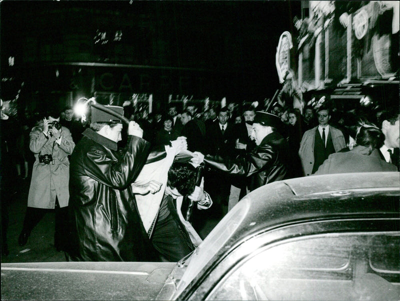 Two young boys wearing protective face masks and gloves stand outside the "И CARP 186" store in Moscow, Russia. - Vintage Photograph