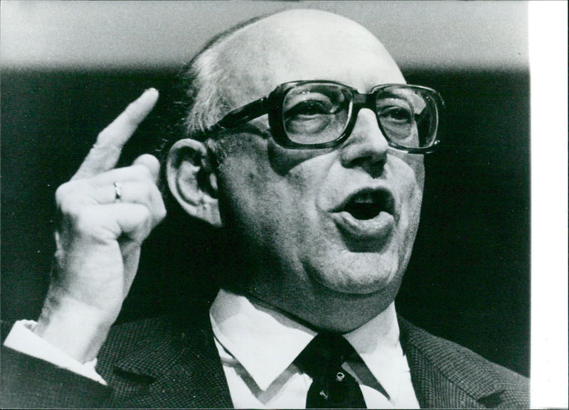 Wolfgang Mischnick, Chair-man of the West German Bundestag and co-founder of the Liberal Democratic Party, speaks during an event in 1985. - Vintage Photograph