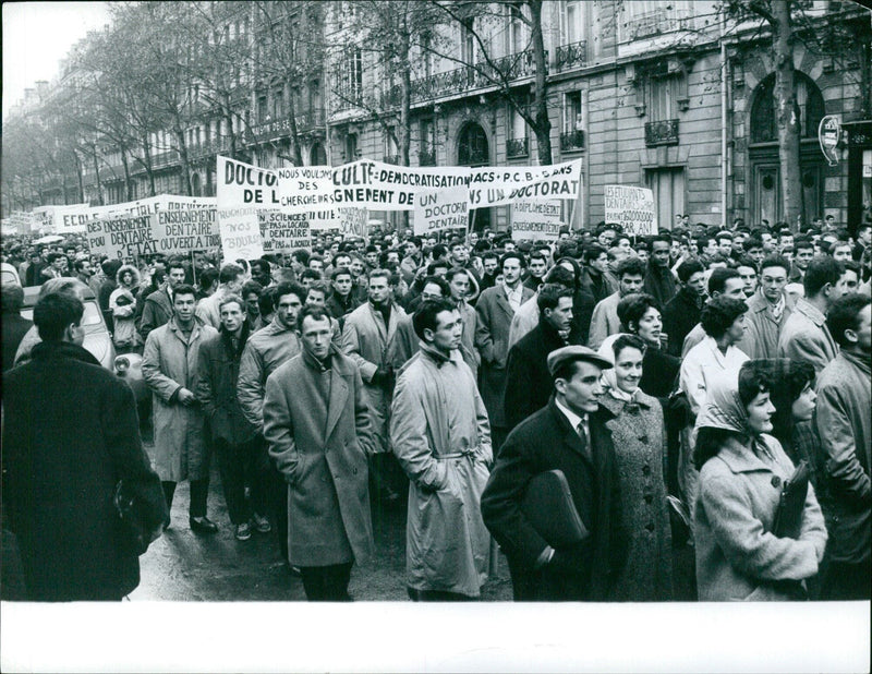 Students from the Ciale Maison de Se Pur school celebrate the democratization of access to dental education in the form of a doctorate, funded by the government. - Vintage Photograph