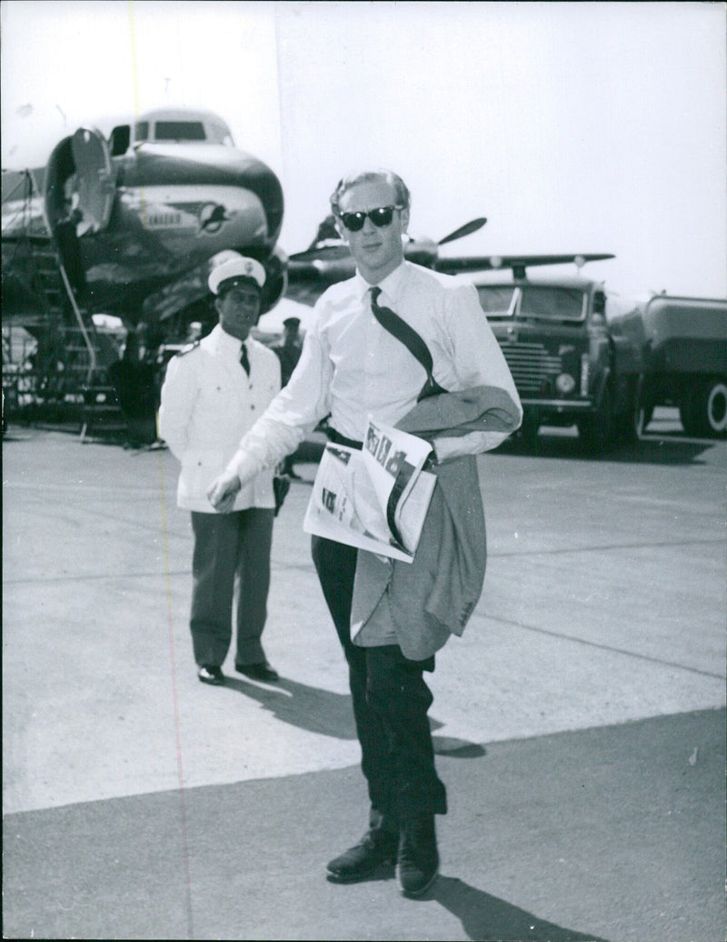 British pianist Robin Douglas Home, former fiancé of Princess Margaretha of Sweden, arrives at Ciampino Airport in Rome en route to South Africa. - Vintage Photograph