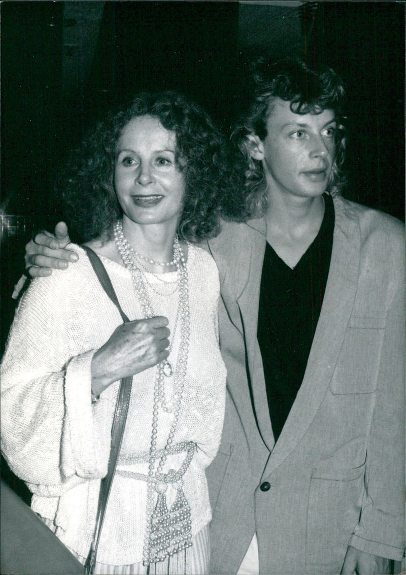 British actress Sarah Miles poses with her son Tom from her marriage to Robert Bolt. Tom is not intending to follow his parents into the acting profession. - Vintage Photograph