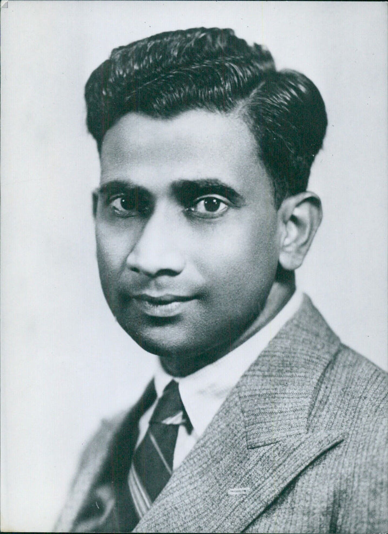 The Hon. Sir Lalita Rajapakse, Minister of Justice of Ceylon, is pictured in this press photograph from Camera Press London. - Vintage Photograph