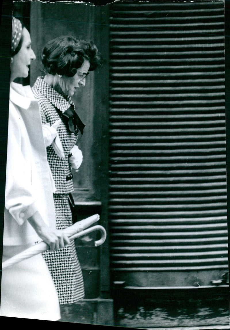 Mrs. Kennedy greets a crowd of onlookers during her visit to Stockholm, Sweden on August 1, 1963. - Vintage Photograph