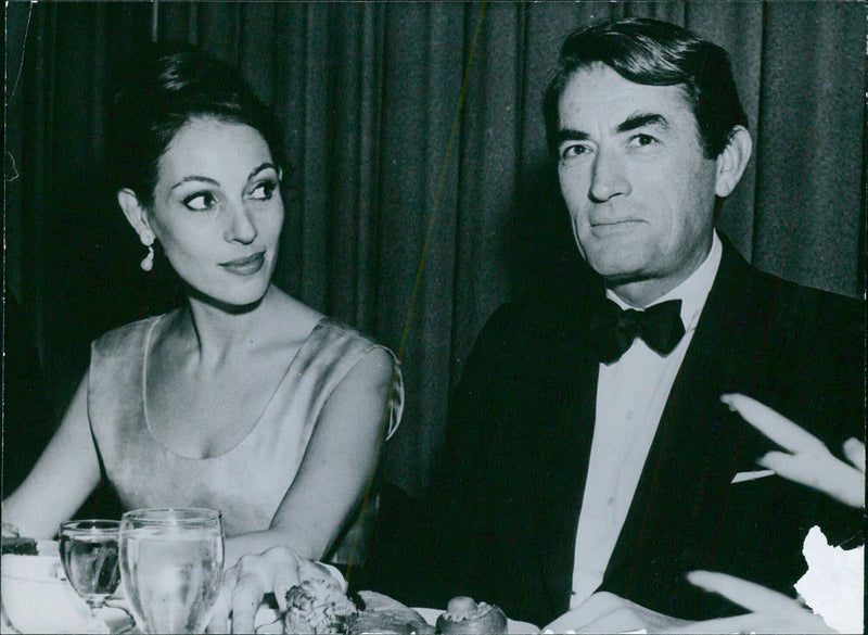 Actor Gregory Peck and his wife Veronique, pictured on December 21, 1965 in Stockholm, Sweden. - Vintage Photograph