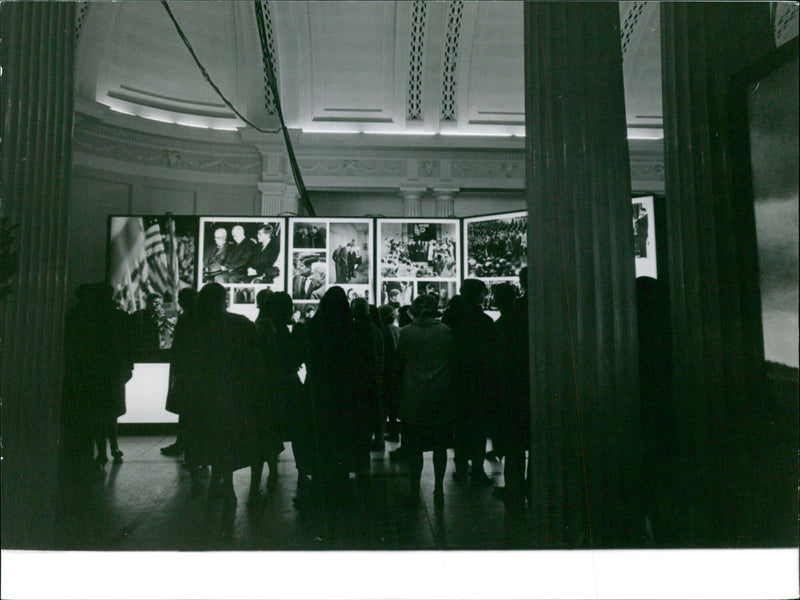 People wait in line to enter the Ipannon Sig store in Budapest, Hungary on June 12th, 2021. - Vintage Photograph