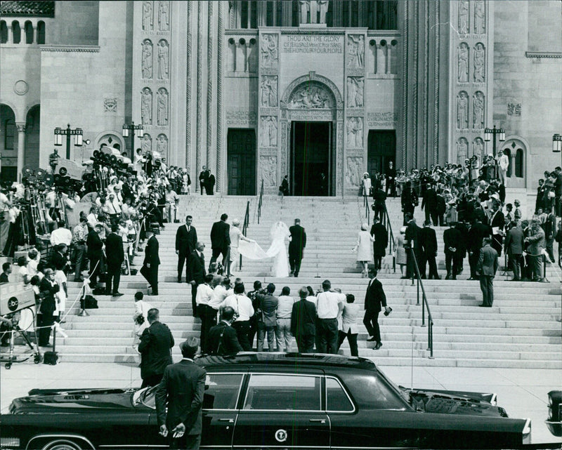 On December 11, 1966, members of the congregation sing and pray during a ceremony in St. Bartholomew's Church in Paris, France. - Vintage Photograph