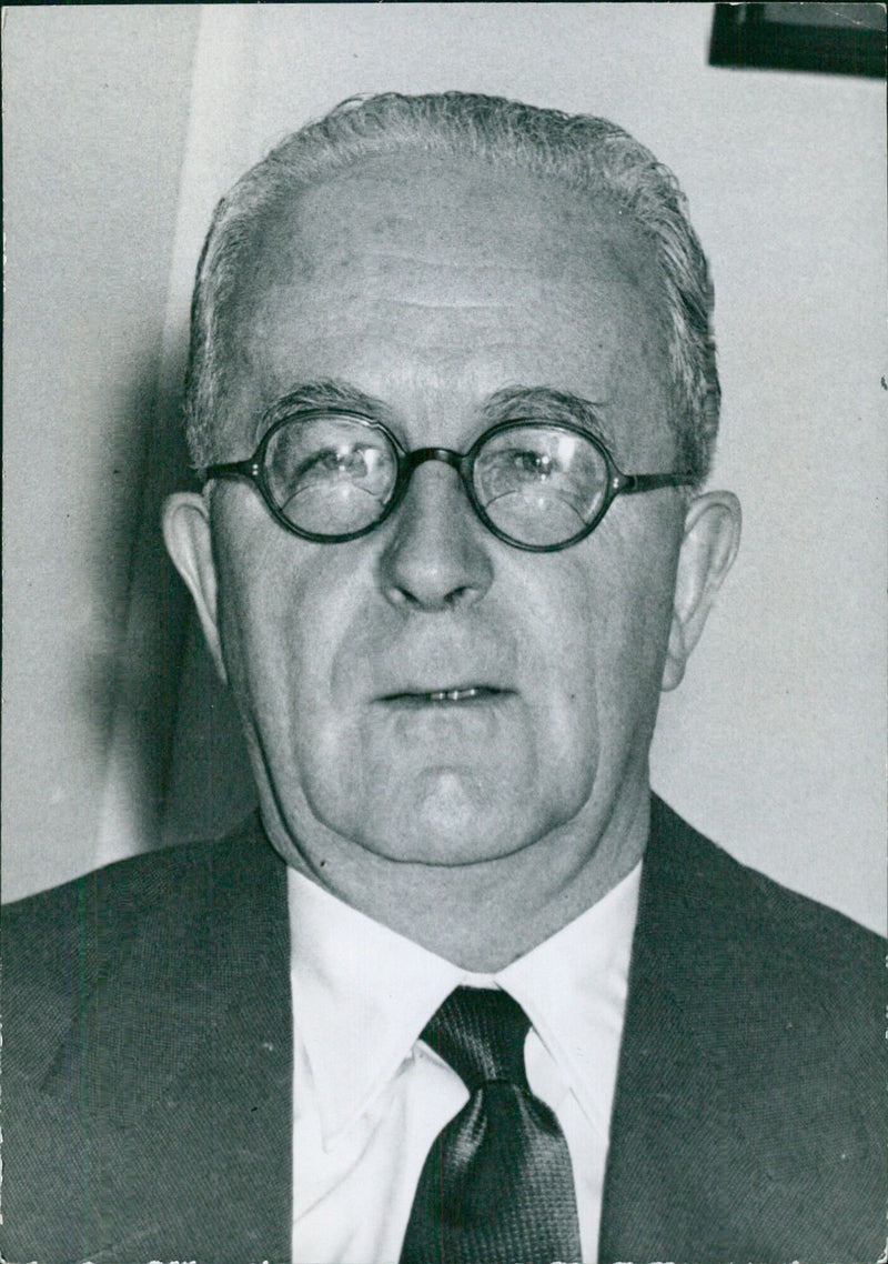 Lord Radcliffe, P.C., G.B.E., Baron Radcliffe of Werneth, arrives at Russell Court in London to be appointed as a Constitutional Commissioner for Cyprus in 1956. - Vintage Photograph