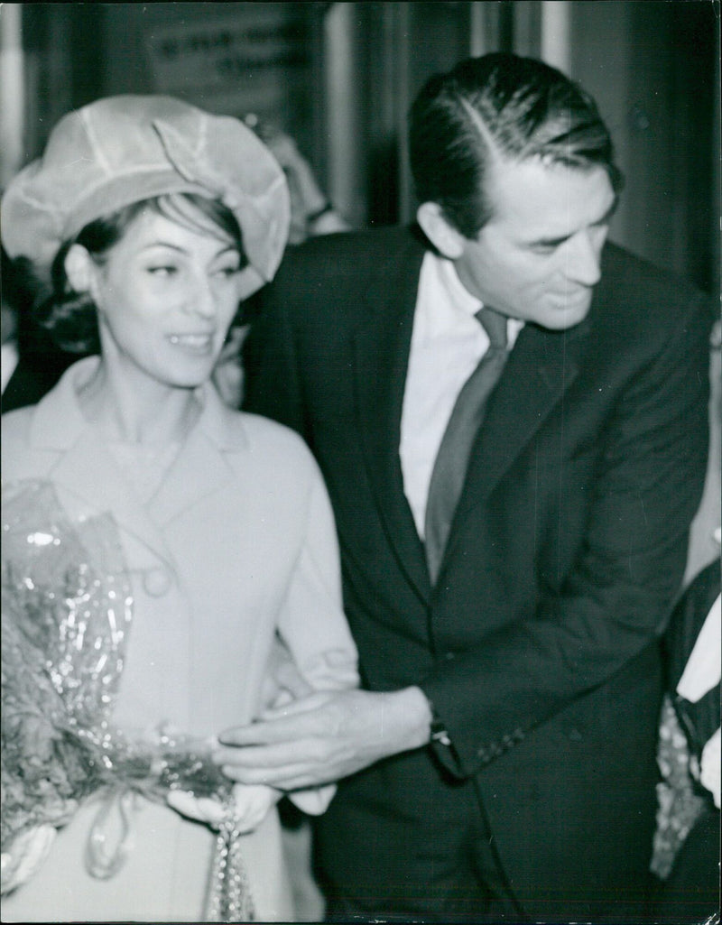 Actors Veronique and her husband pose for photographers at the 18th International Film Festival in Milan, Italy. - Vintage Photograph