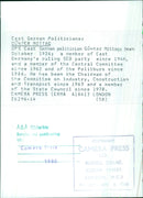 Günter Mittag, a long-time East German politician and member of the SED party, stands outside the East German Parliament in 1985. - Vintage Photograph