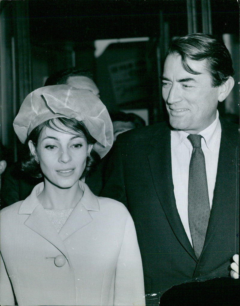 Hollywood stars Gregory Peck and his wife Veronic attend the 63rd International Film Festival in Milan, Italy. - Vintage Photograph