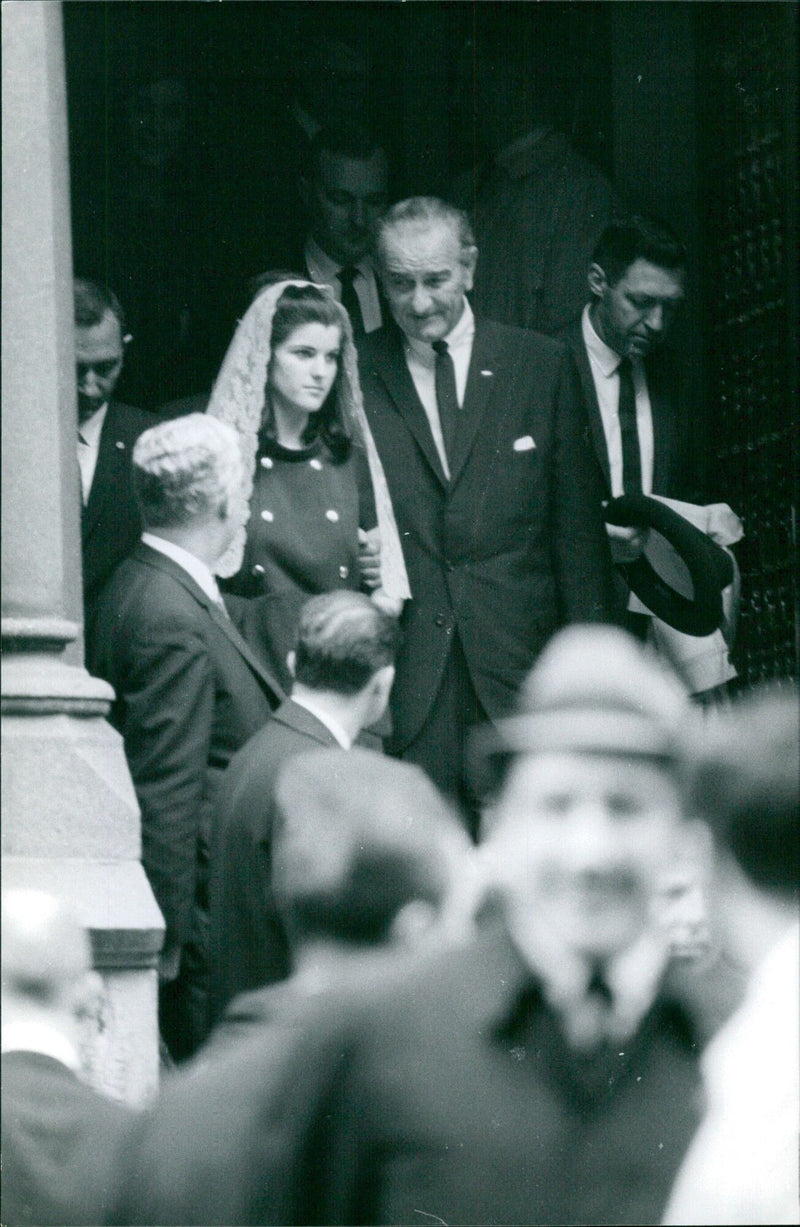 A father and daughter embrace in Stockholm, Sweden. - Vintage Photograph