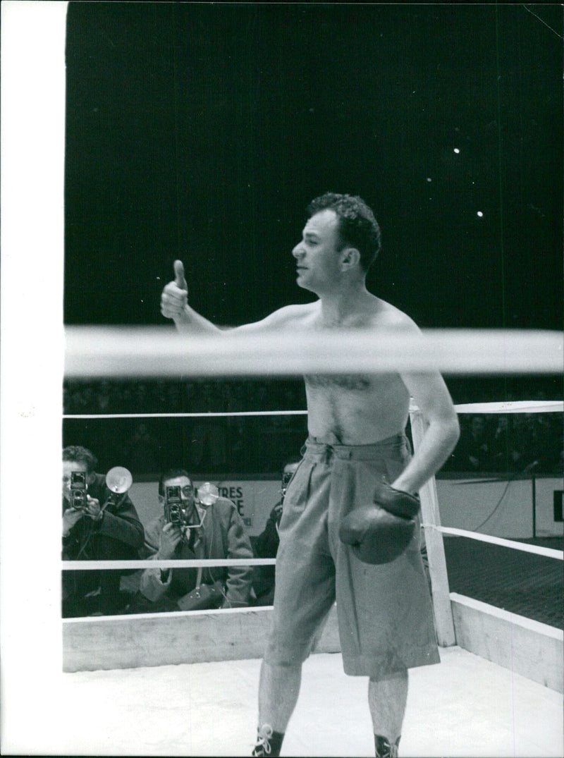 French tennis player Pierre-Cherron celebrates his victory at the 2021 French Open in Paris. - Vintage Photograph