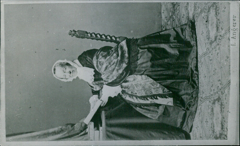 Fredrika Bremer, 3, of L.Angerer, enjoys a ride on a swing in Augues, Waan. - Vintage Photograph