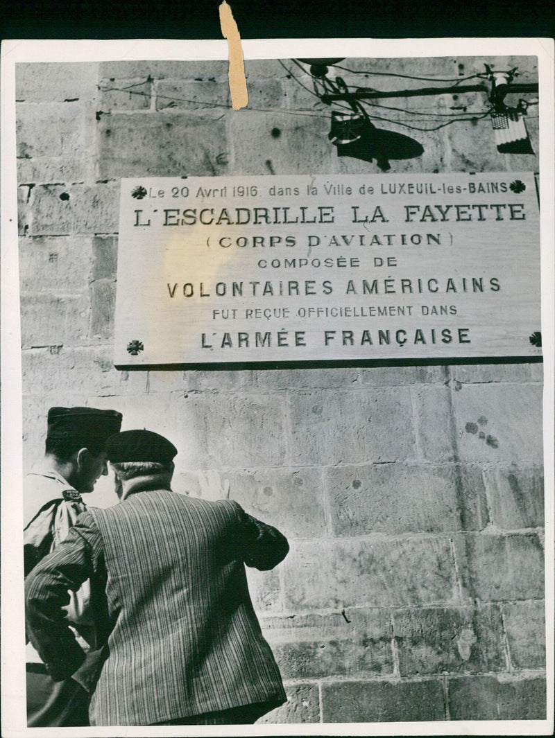 On April 20, 1916, in the city of Luxeuil-les-Bains, the Lafayette Escadrille, composed of American volunteers, is officially received into the French Army. - Vintage Photograph