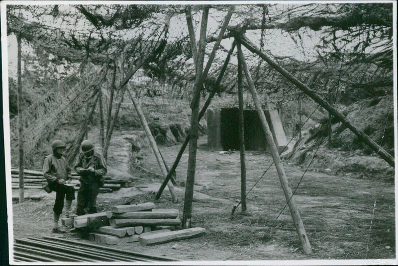 U.S. soldiers capture a flying bomb launching site in northern France, 1944. - Vintage Photograph