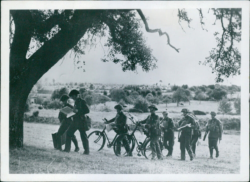 British troops of the E 35 Engelska o allied regiment of the NU Service Cinematographique de l'Adorge Section Photo gather in an unknown location in France. - Vintage Photograph