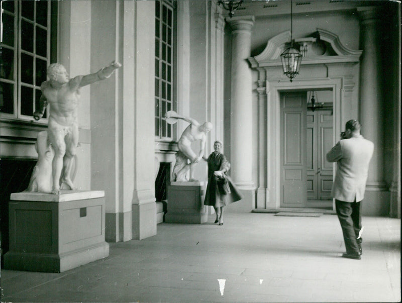 Esther Williams and Ben Gage visit the Palace, with Gage filming the event. - Vintage Photograph