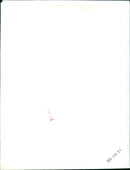 A contestant holds a mug after winning a bid at an auction in Virginia. - Vintage Photograph