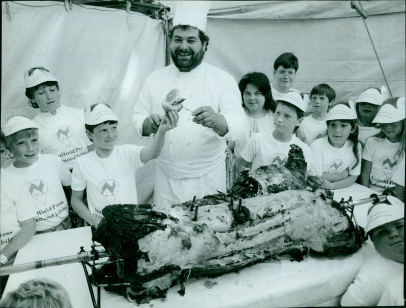 Former and current employees of Nuffield Press celebrate the company's diamond jubilee at an open day in Cowley, Oxfordshire. - Vintage Photograph