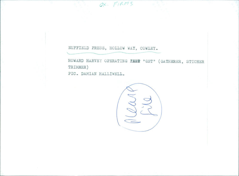 Howard Harvey operating a machine at a printing firm in Cowley. - Vintage Photograph