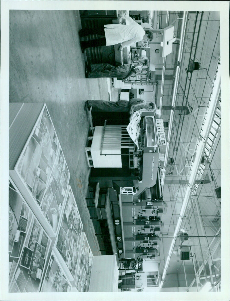 A Heidelberg Speedmaster 325272 96 9 printing press in operation. - Vintage Photograph