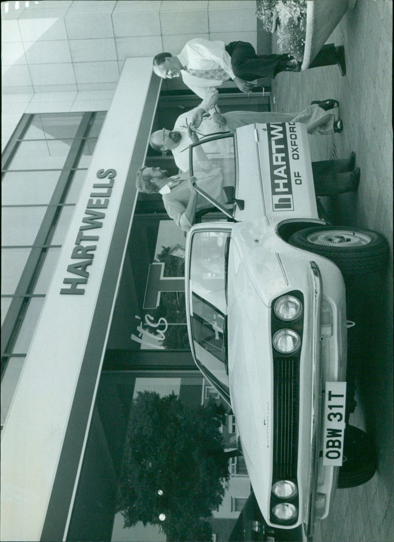 Two men and an Oxford firm's car ready for a Round Europe drive. - Vintage Photograph