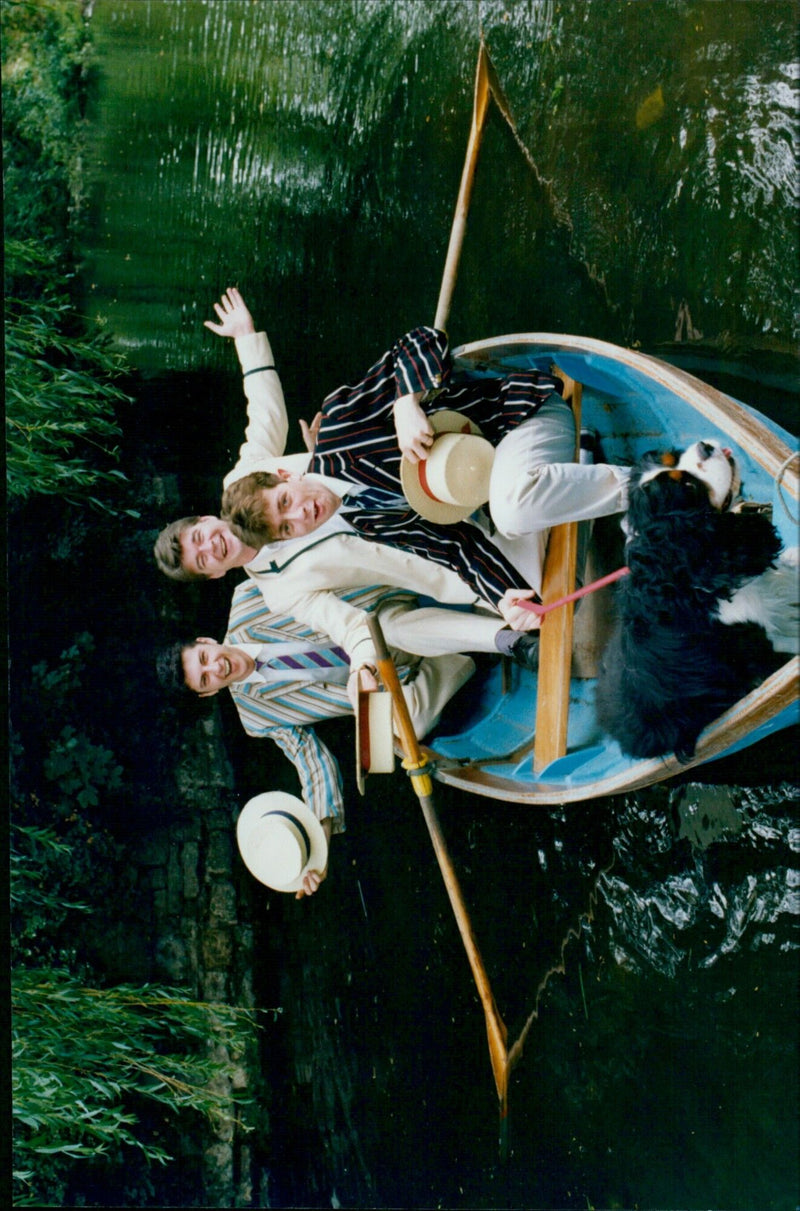 Three men in a boat on Magdalen Bridge in Oxford, UK. - Vintage Photograph