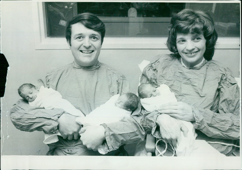 The Coxon family of Earley, England with their quadruplets Alison, Neil, John, and Radlik. - Vintage Photograph