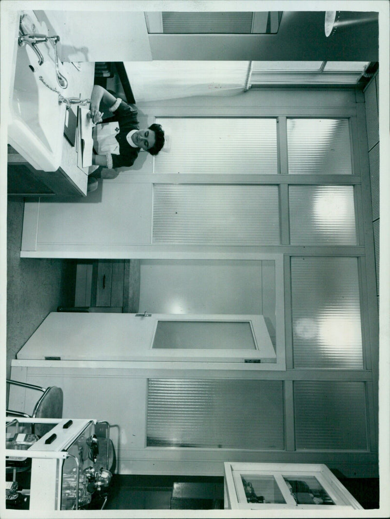 Employees of the A.C. Nilson Co Ltd T Health Centre take a break from their daily work. - Vintage Photograph