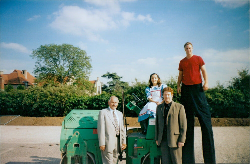 Members of Creation Theatre Company and Architects Design Partnership break ground on the new Magdalen College School. - Vintage Photograph