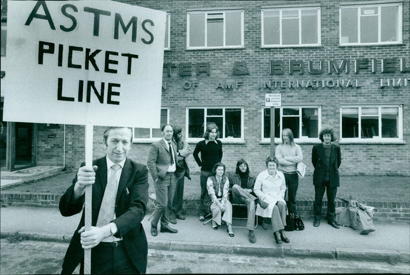 Picketers form a line outside of Potter & Brumfield in Oxford, UK. - Vintage Photograph